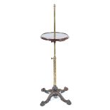 A 19th century brass and iron adjustable etegere with circular mahogany tray