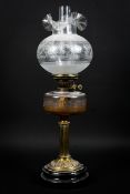 A brass and cut glass bowl with acid etched glass shade oil lamp 62cm high