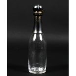 A Victorian silver mounted flip top glass bottle,