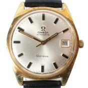 A gents Omega automatic geneve wristwatch, the silvered dial with gilt batons denoting hours,