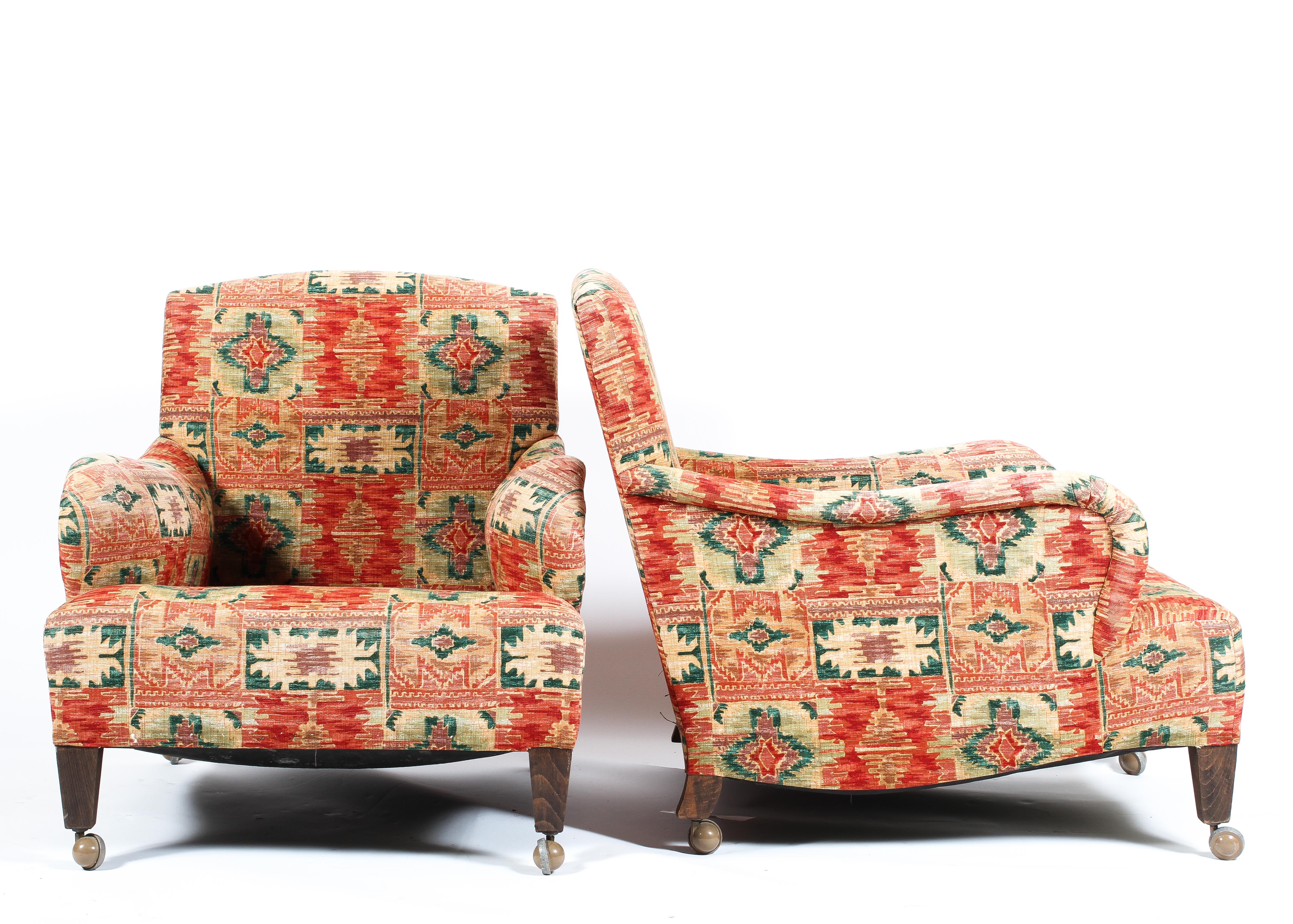 A pair of 20th century Howard style lounge chairs on square tapered legs roll over arm & swept side - Image 2 of 3