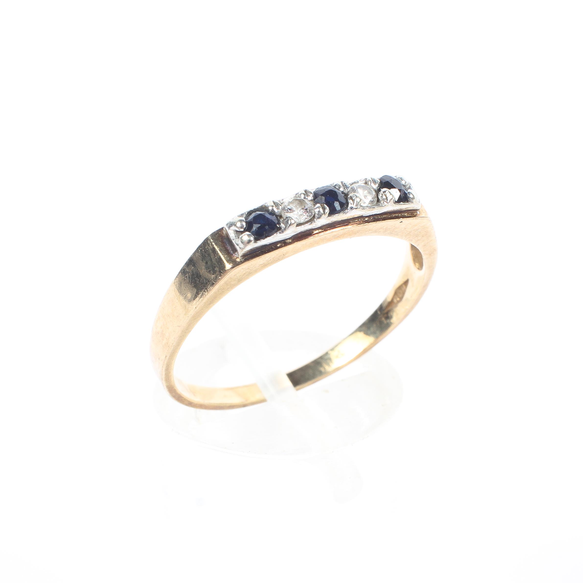 A 9ct gold sapphire and diamond dress ring, set with three round cut sapphires and two diamonds,