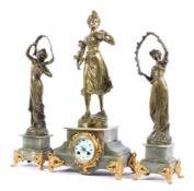 A French onyx and gilt-metal mounted three piece figural clock garniture,