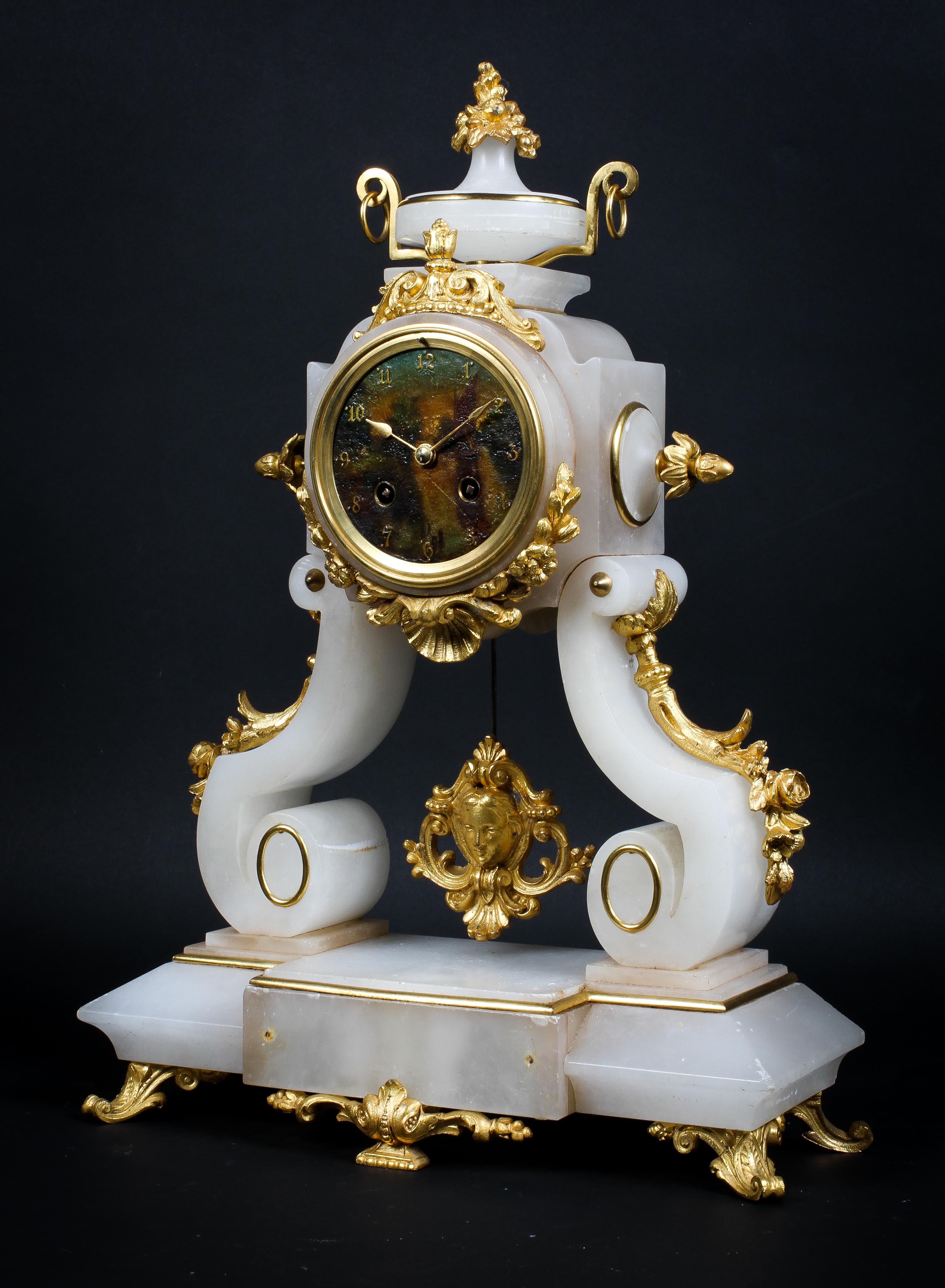 A French alabaster and gilt metal mantle clock,
