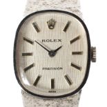 A vintage ladies 14ct white gold Rolex precision, its rounded textured dial with baton hour markers,