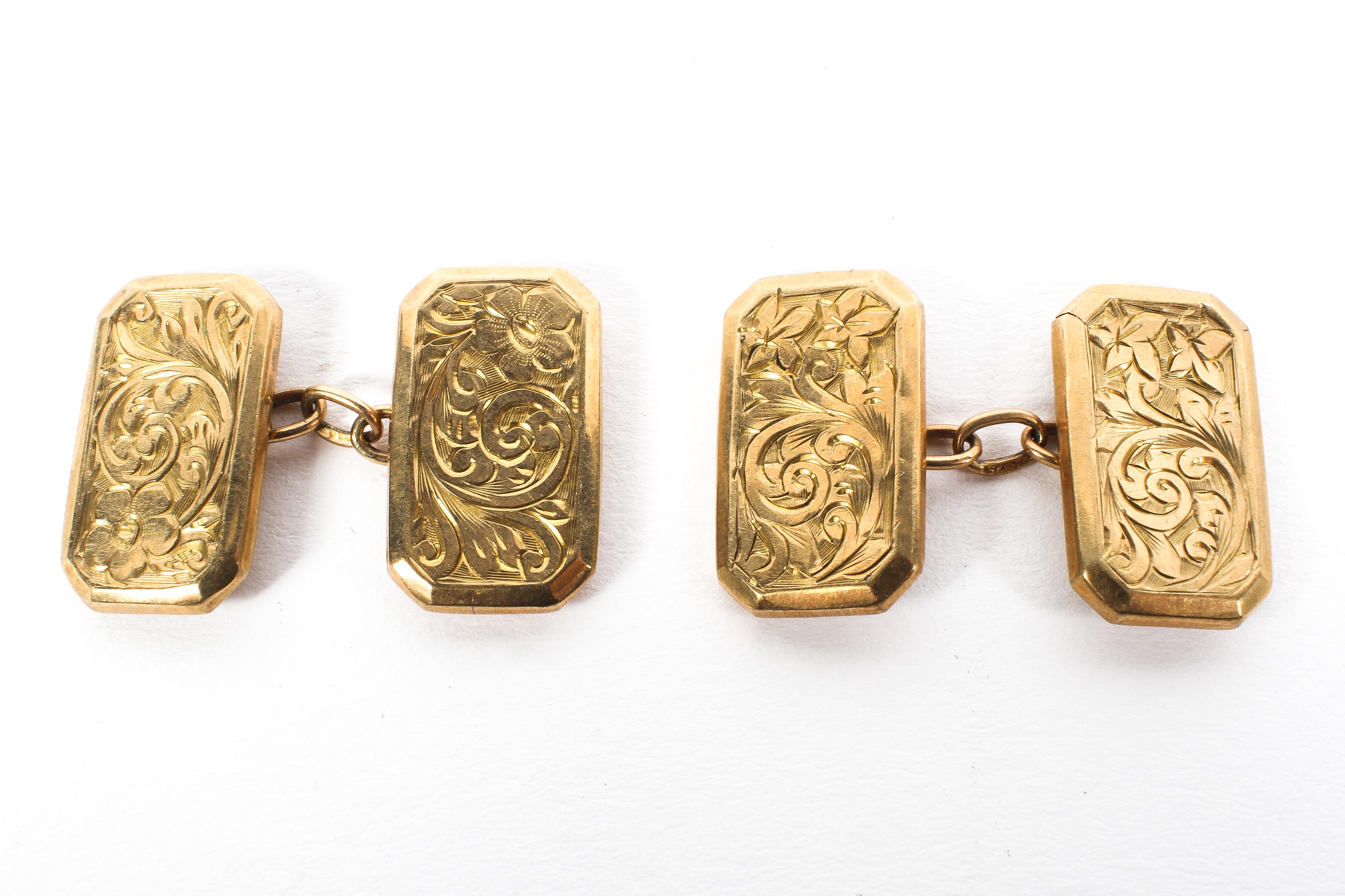 A pair of 9ct gold double backed cuff links, with engraved decoration, 3.