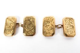 A pair of 9ct gold double backed cuff links, with engraved decoration, 3.