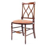 An Edwardian inlaid mahogany bedroom chair with pierced back,