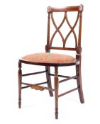 An Edwardian inlaid mahogany bedroom chair with pierced back,