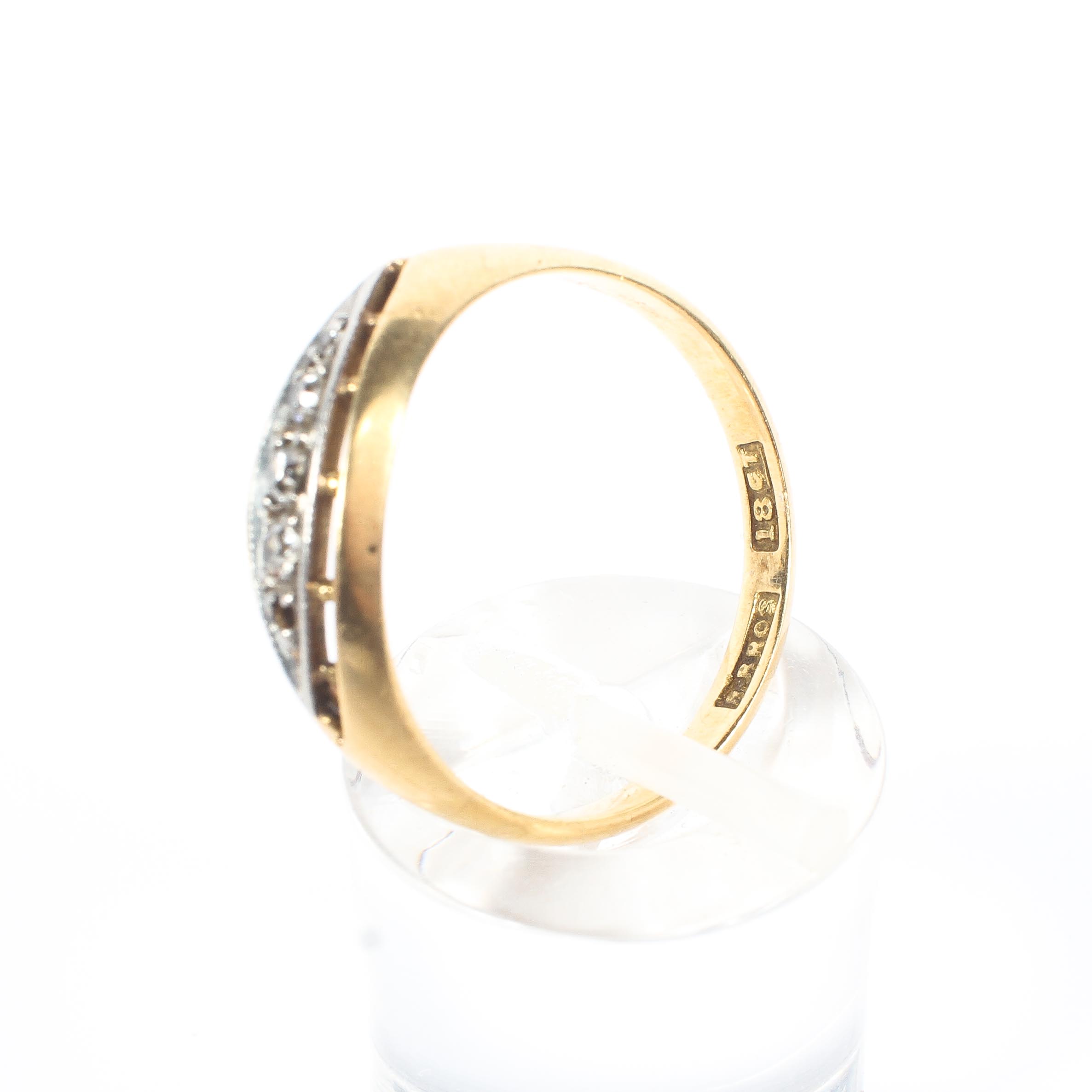 An 18ct gold and diamond ring, set with a graduated line of single cut diamonds (one stone missing), - Image 4 of 4