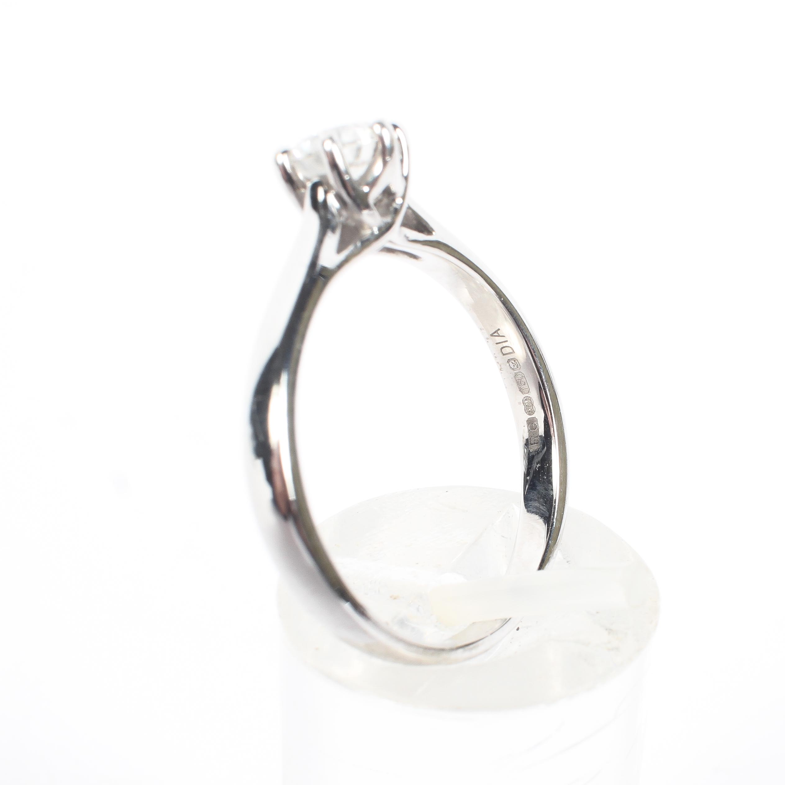 An unmarked white metal and single stone diamond ring, Central 0. - Image 5 of 7