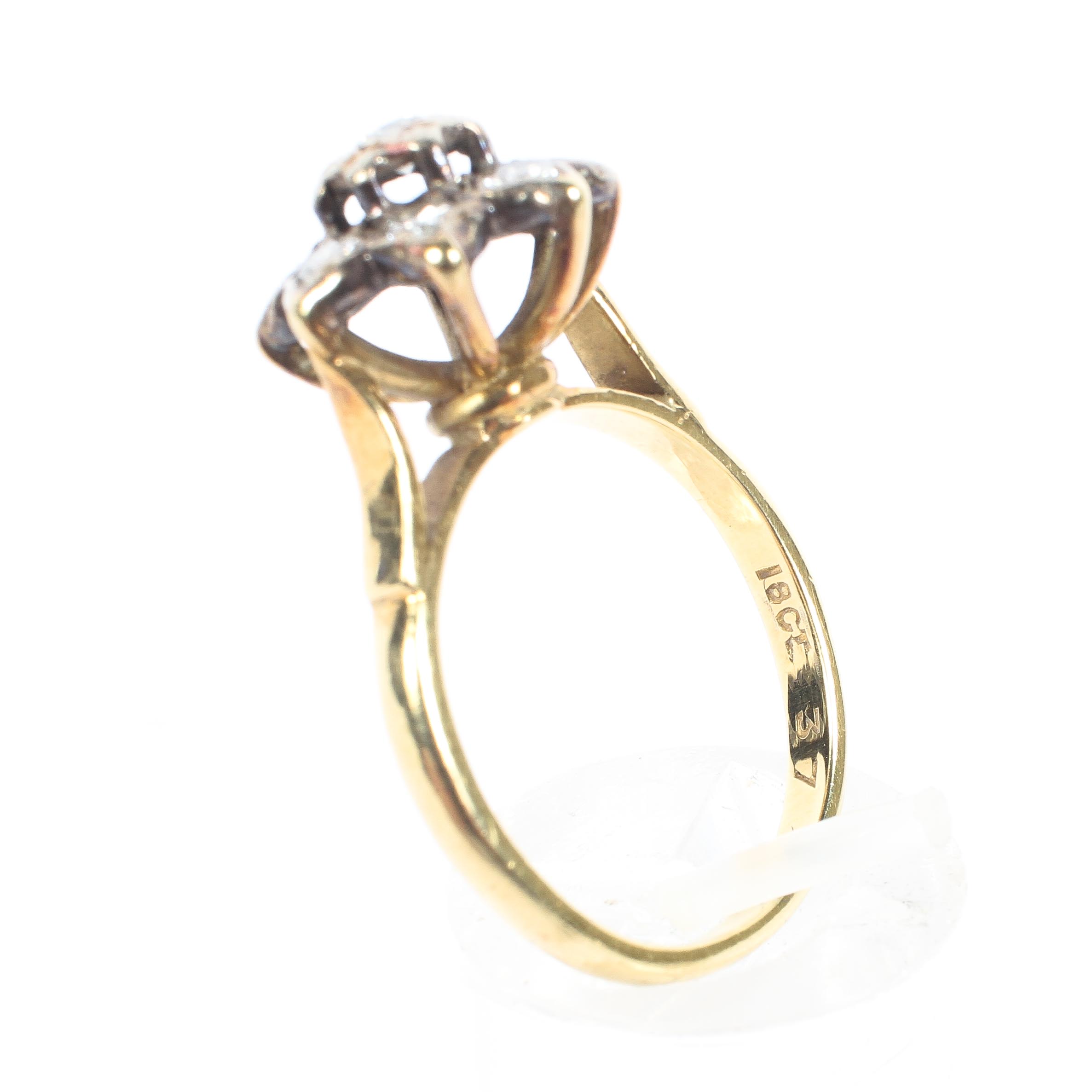 An 18ct gold and diamond cluster ring, set with nine brilliant cut diamonds, central stone approx 0. - Image 4 of 4