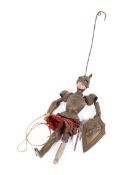 A Wooden & metal figure of a knight,
