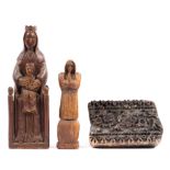 Two carved wooden religious figures and a carved woodblock,