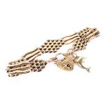 A 9ct gold gateleg bracelet with heart locket,