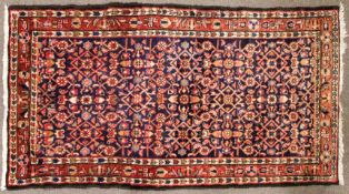 An eastern wool work Quality hamaedan blue red repeated design rug 197x100cm (26/19).