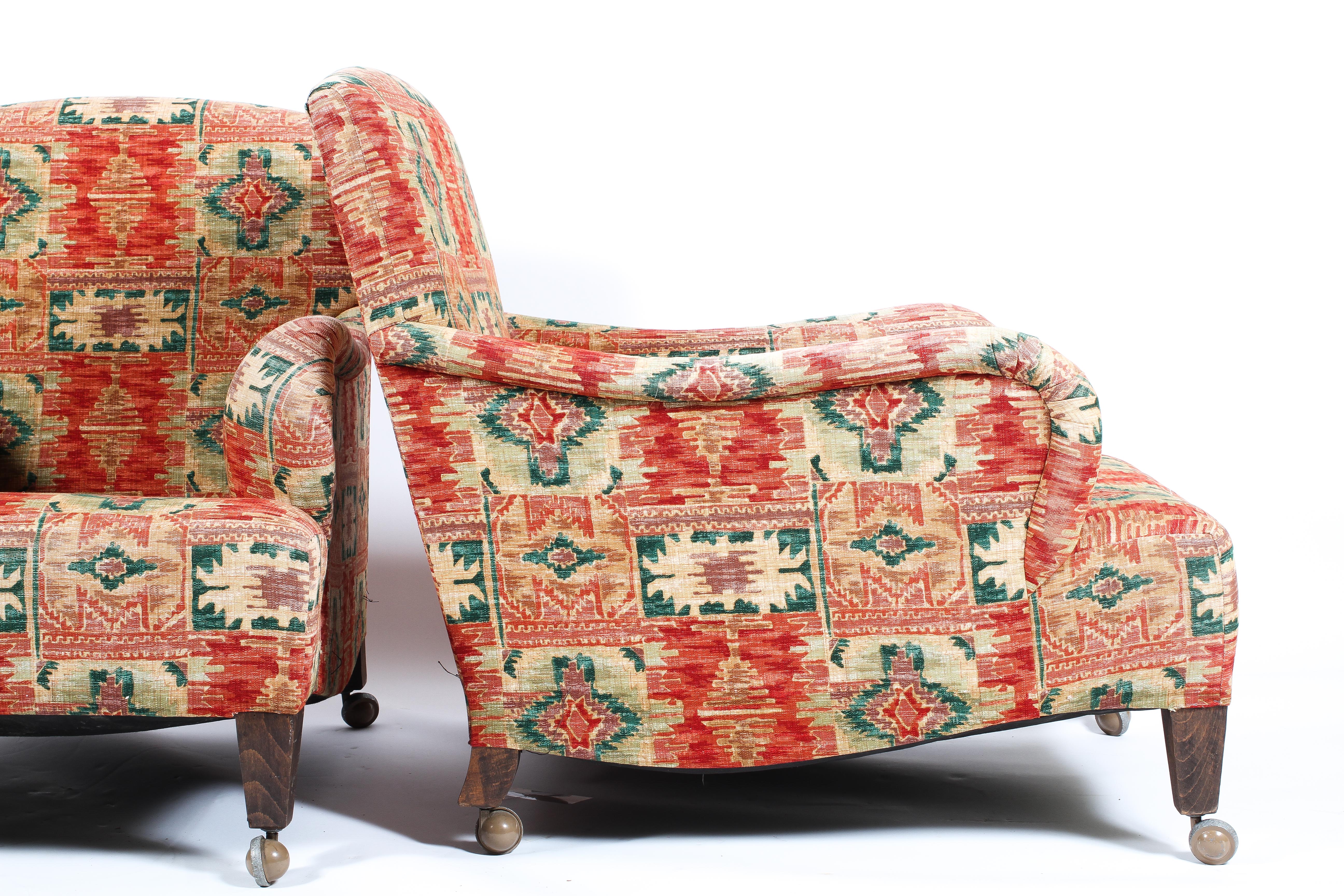 A pair of 20th century Howard style lounge chairs on square tapered legs roll over arm & swept side - Image 3 of 3
