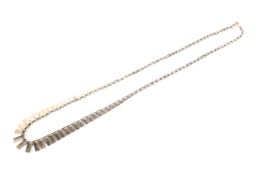 A 9ct gold flat link necklace. 38cm. 4.8g.