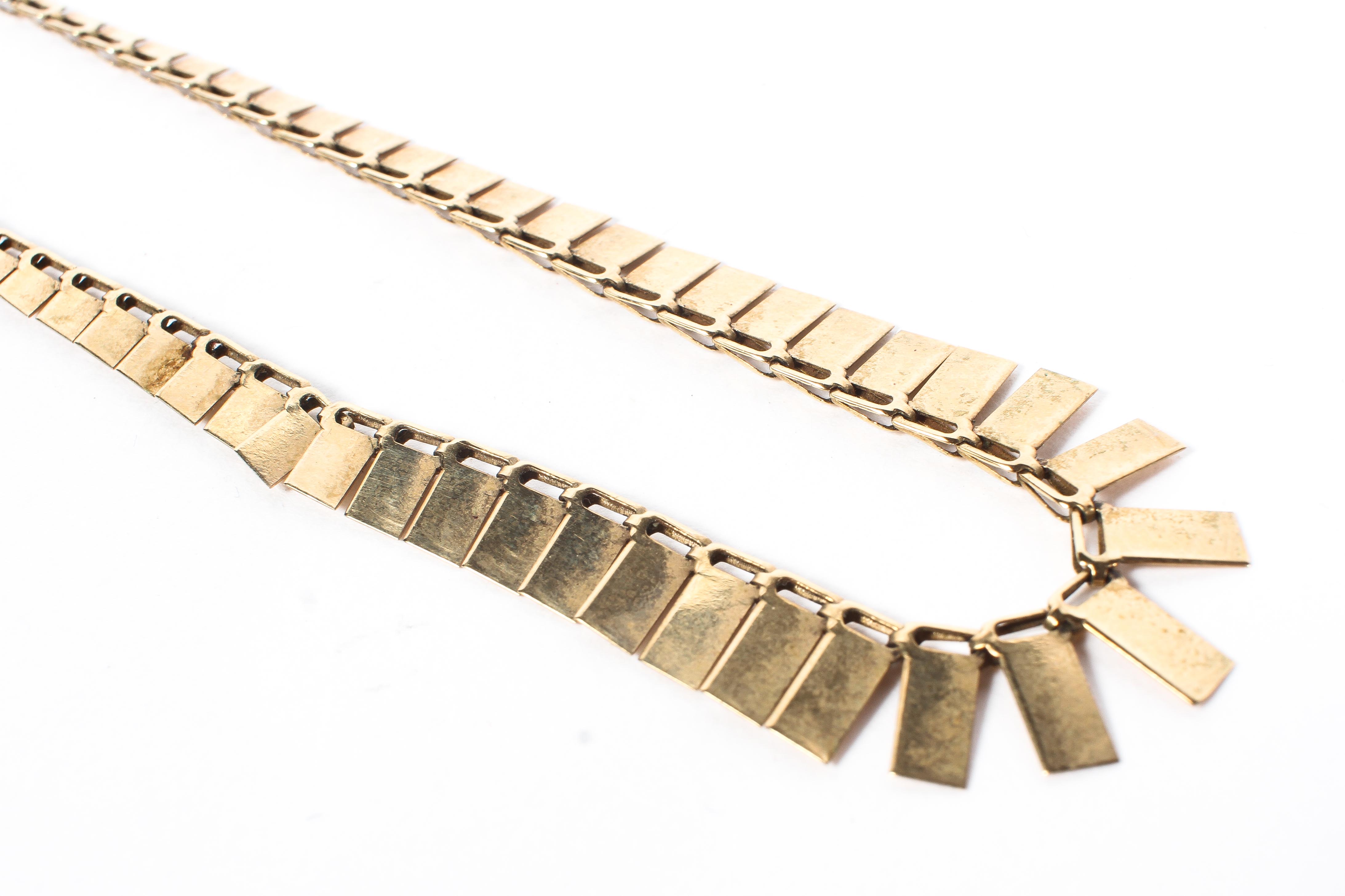 A 9ct gold flat link necklace. 38cm. 4.8g. - Image 2 of 2