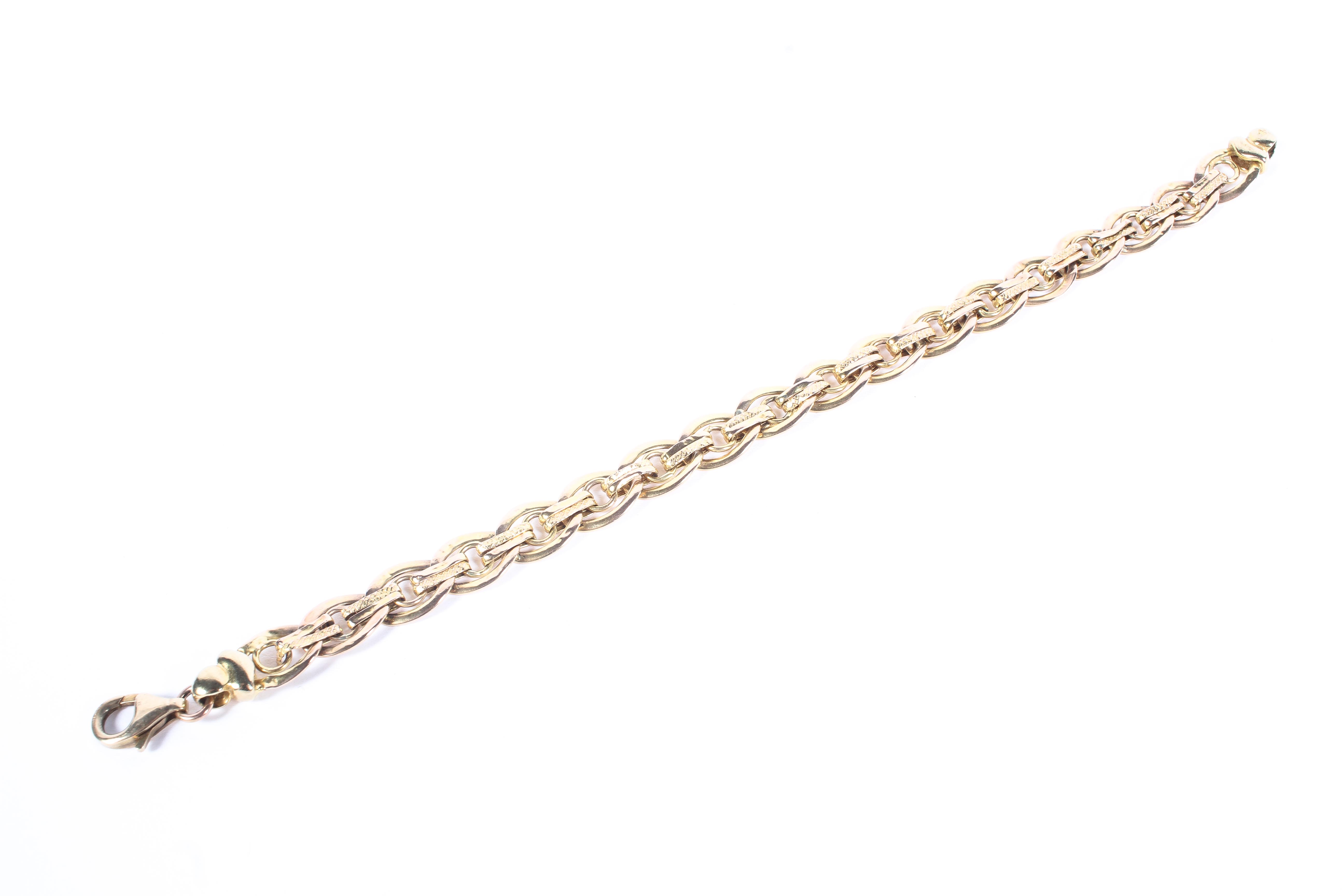 A 9ct gold decorative link bracelet, 7.