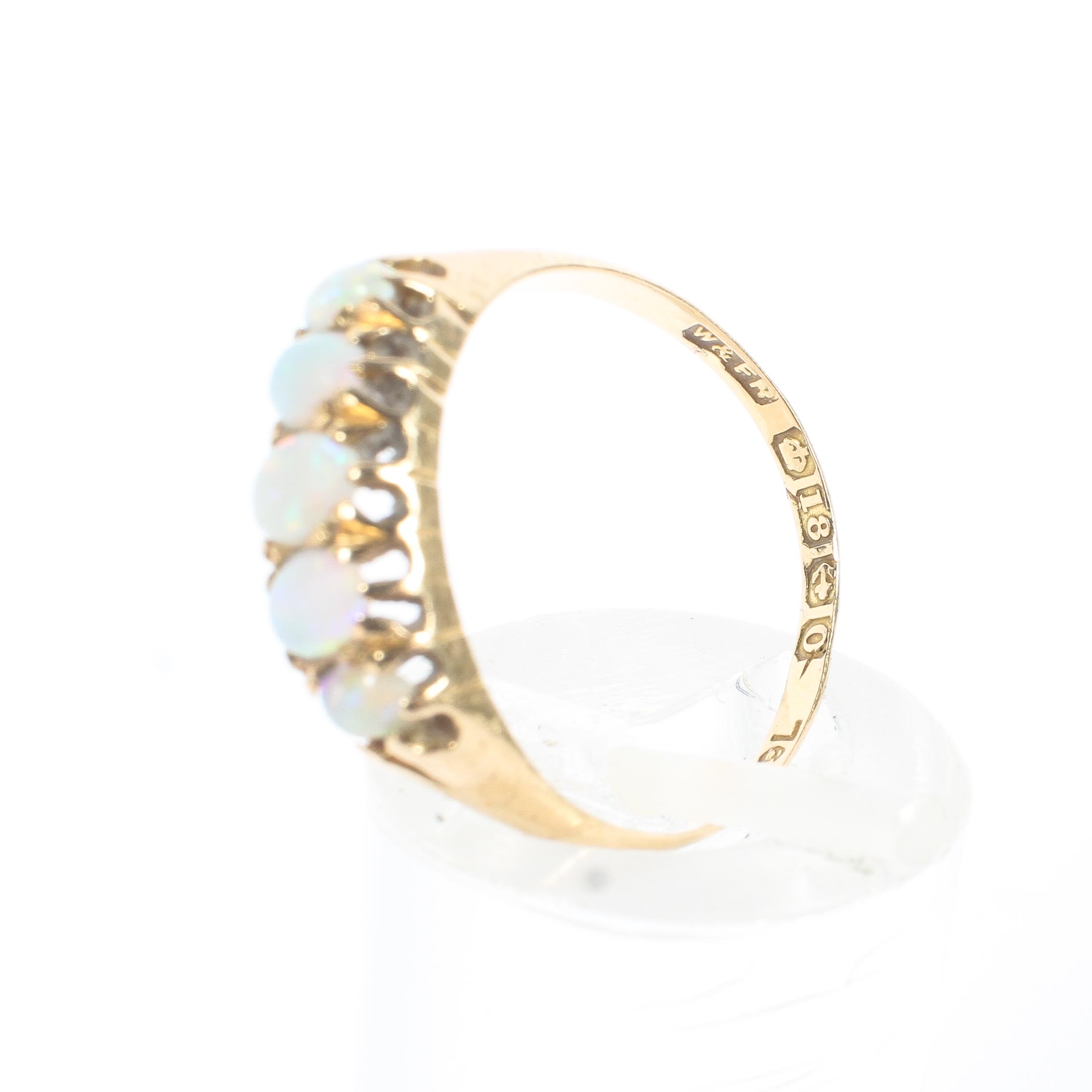 An 18ct gold five stone opal dress ring, draws colour, featuring five graduated stones, 2. - Image 4 of 4