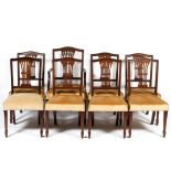 A set of eight Georgian style mahogany dining chairs, late 19th century, including one armchair,