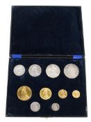 A Victorian 1887 sovereign gold and silver coin set,