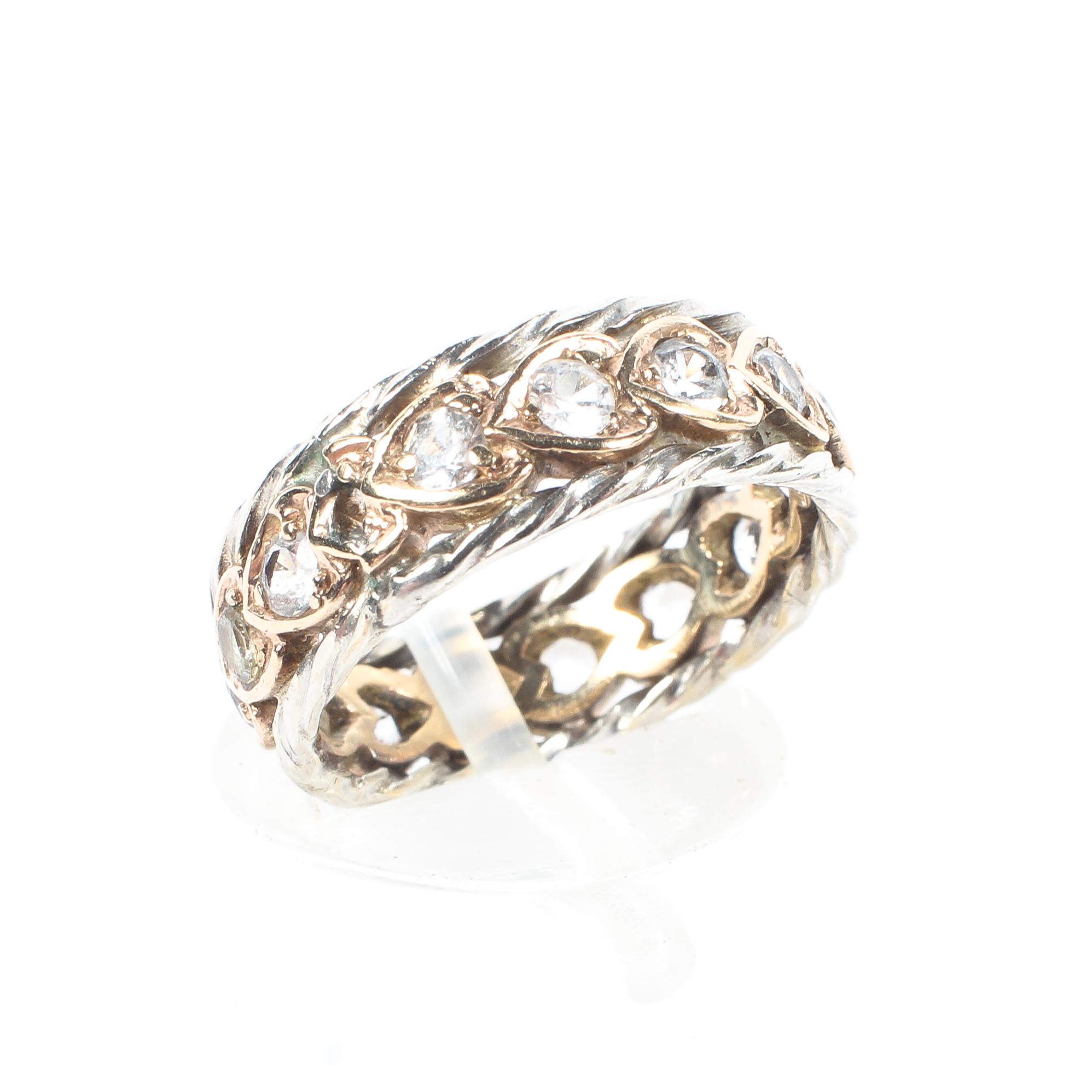A 9ct yellow and white gold diamond full eternity ring.