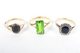 Three ladies gem set dress rings, one an 18ct gold sapphire and diamond chip ring, 1.