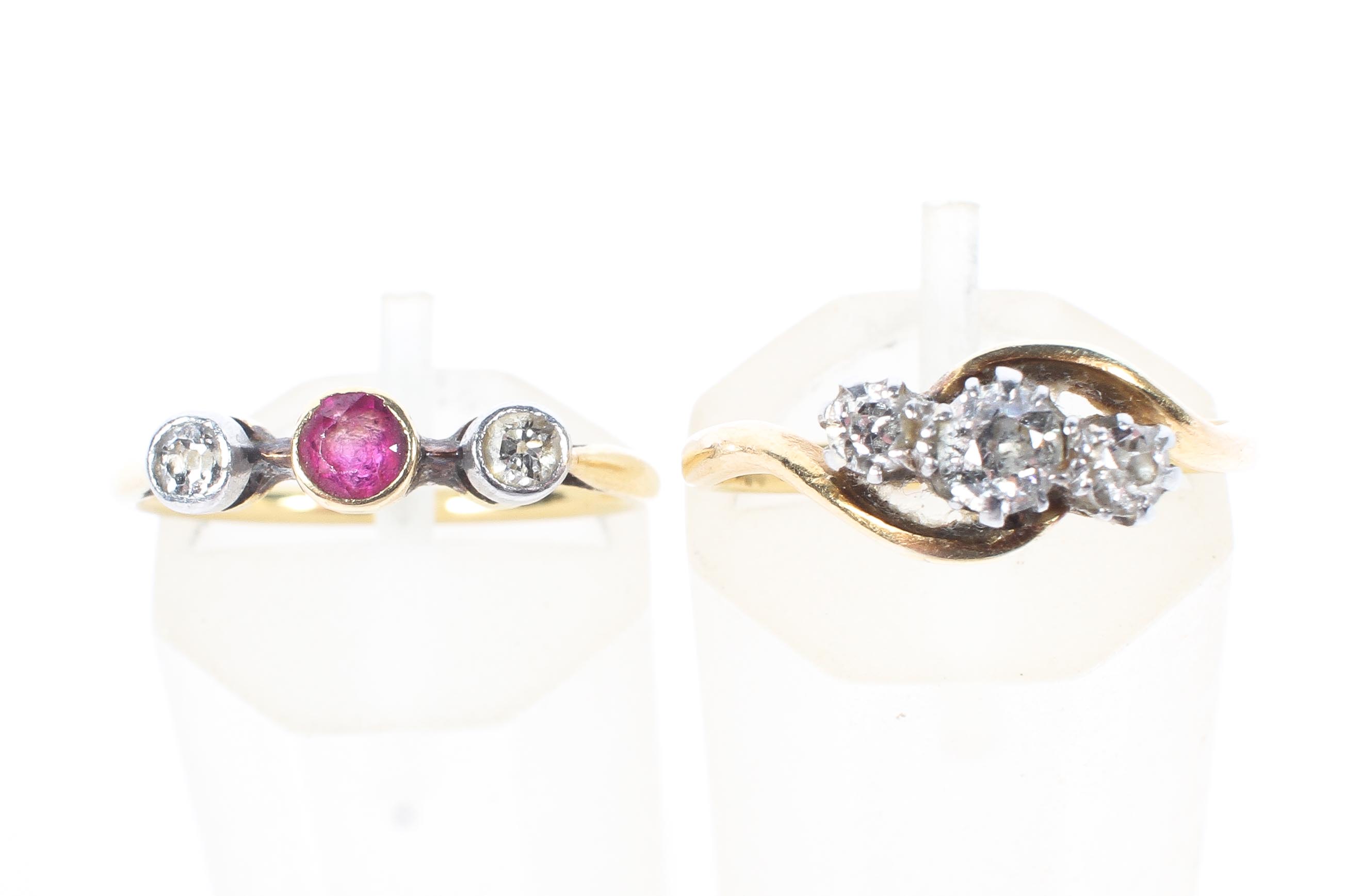 An 18ct gold and diamond three stone ring together with a 9ct ruby ring with diamond accents, - Image 2 of 5