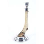 An Edwardian silver mounted deer hoof and leg candlestick,
