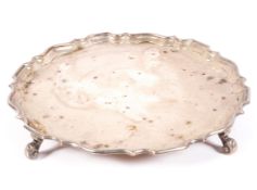 An early 20th century silver salver, of circular form,