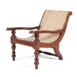 A 1890's childs 'plantation' chair of unusual form the body woven in straw of intricate design