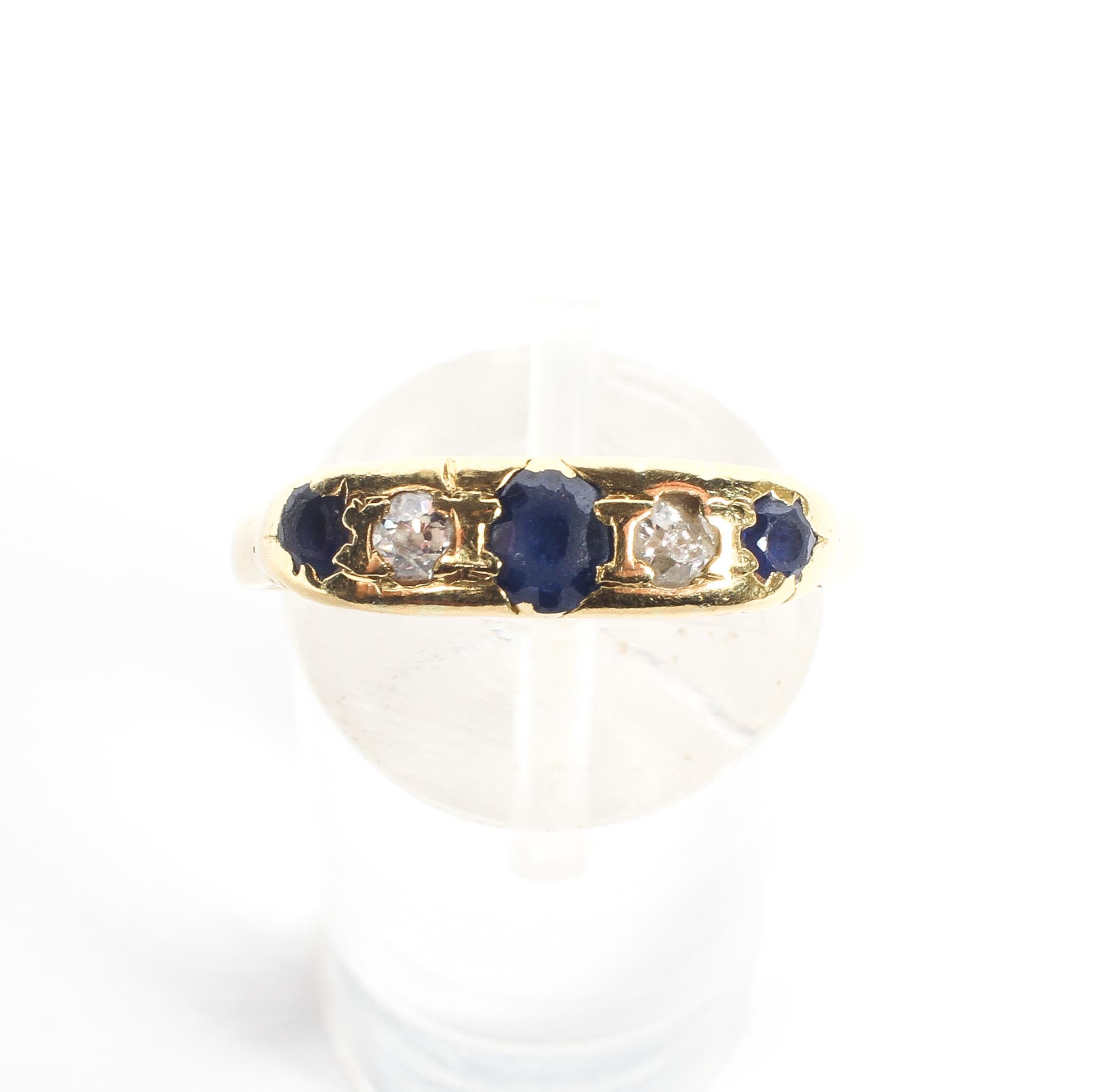 An 18ct yellow gold sapphire and diamond five stone ring, with pierced shank, stamped 18k, 3. - Image 2 of 4