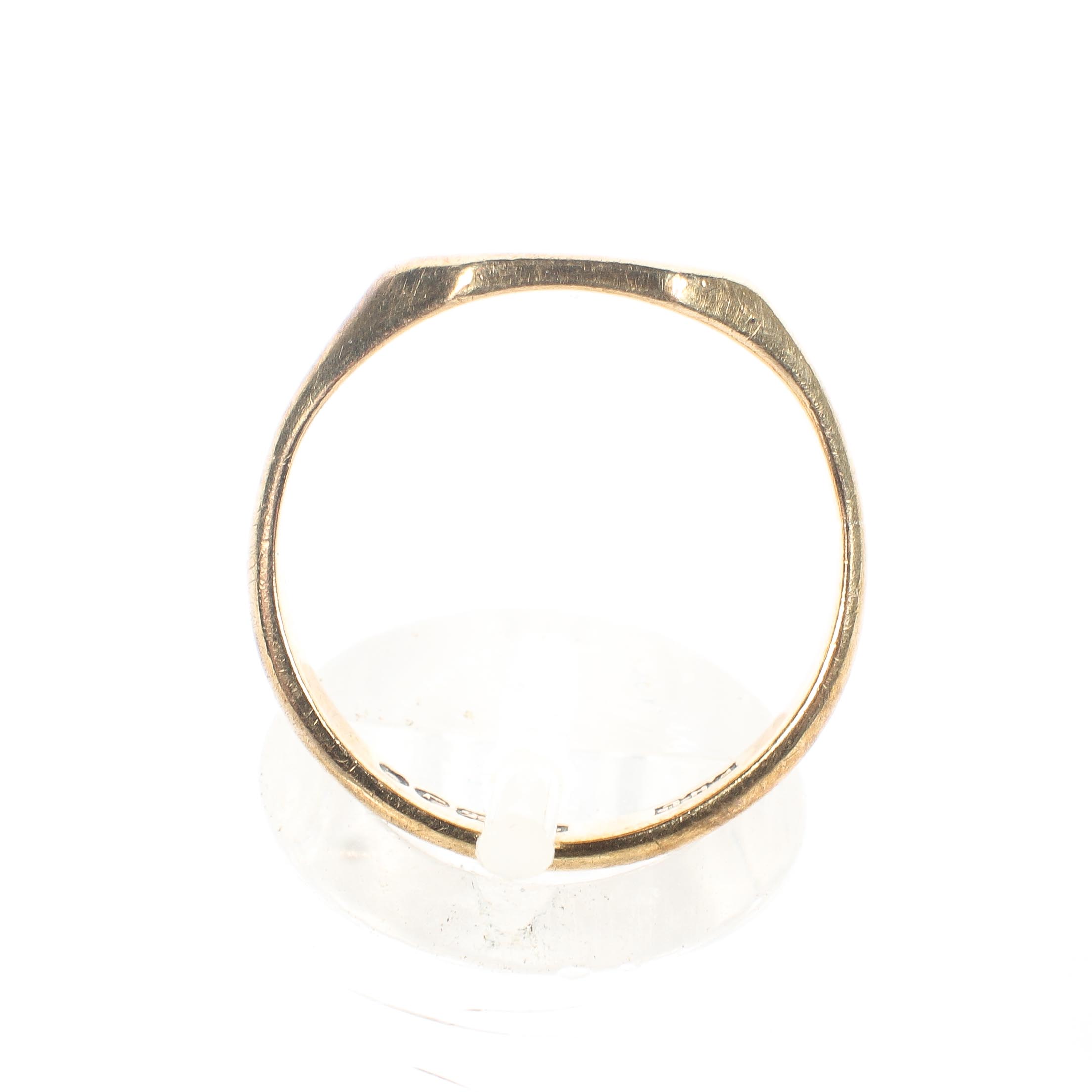 A 9ct yellow gold signet ring, set with a single white stone in a starburst mount to the centre, 3. - Image 3 of 4