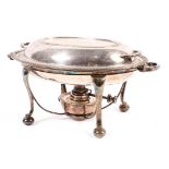 A lidded silver plated muffin dish or food warmer on plated stand with burner,