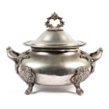 A large late 19th early 20th century silver plated lidded tureen with cast loop handles and feet,