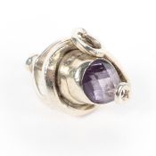 A Tom McEwan white metal art design amethyst set dress ring, 22g, Size H,