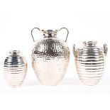 Three 20th century continental silver pots, two marked 925, the other 800,