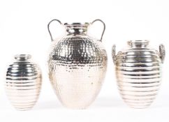 Three 20th century continental silver pots, two marked 925, the other 800,