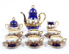 A Vienna part coffee service, containing six cups and saucers, sugar bowl and milk jug,