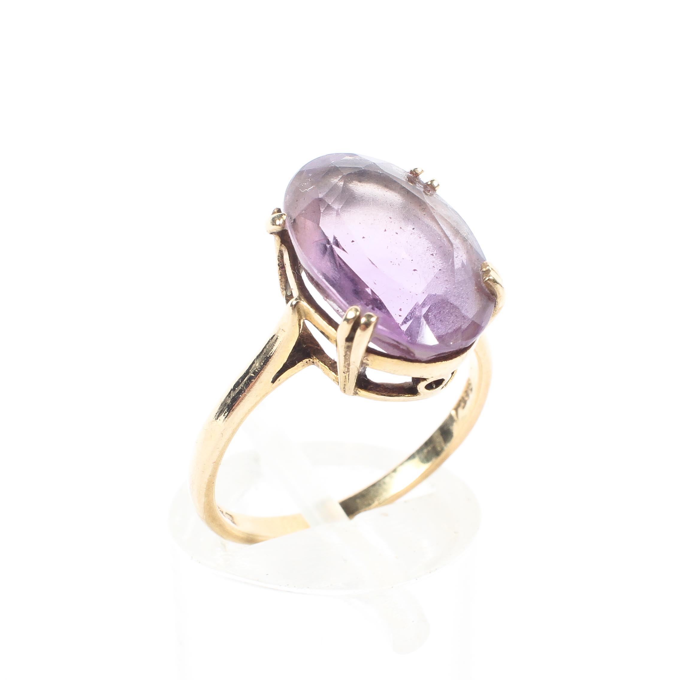 A 9ct gold and amethyst set ring.