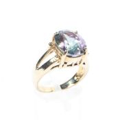 A 9ct gold and Mystic Topaz set dress ring. 5.9g. Size N.