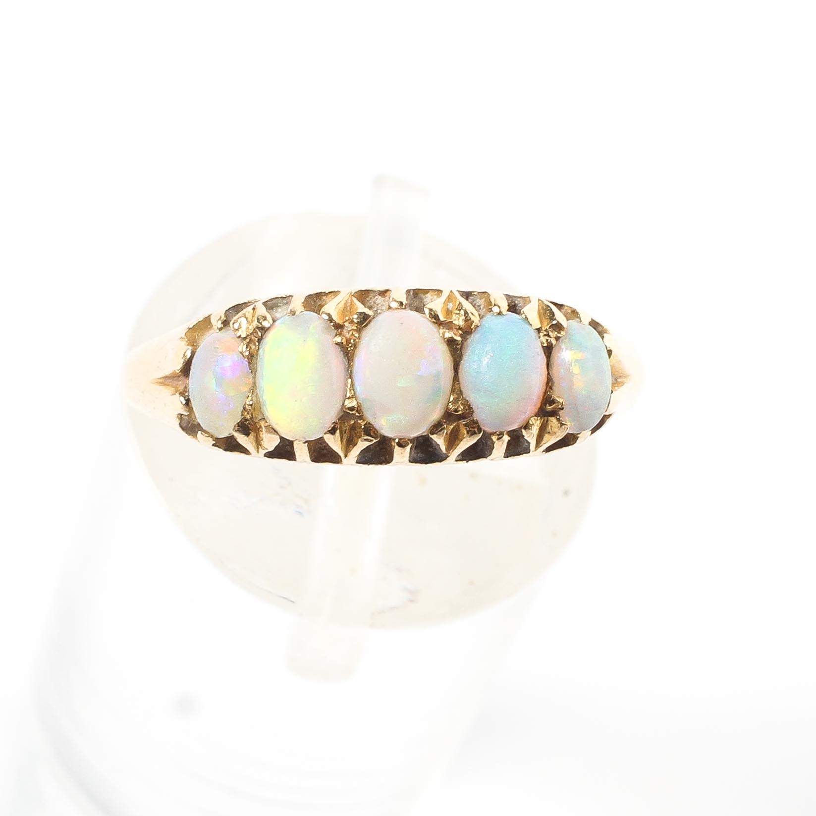 An 18ct gold five stone opal dress ring, draws colour, featuring five graduated stones, 2. - Image 2 of 4