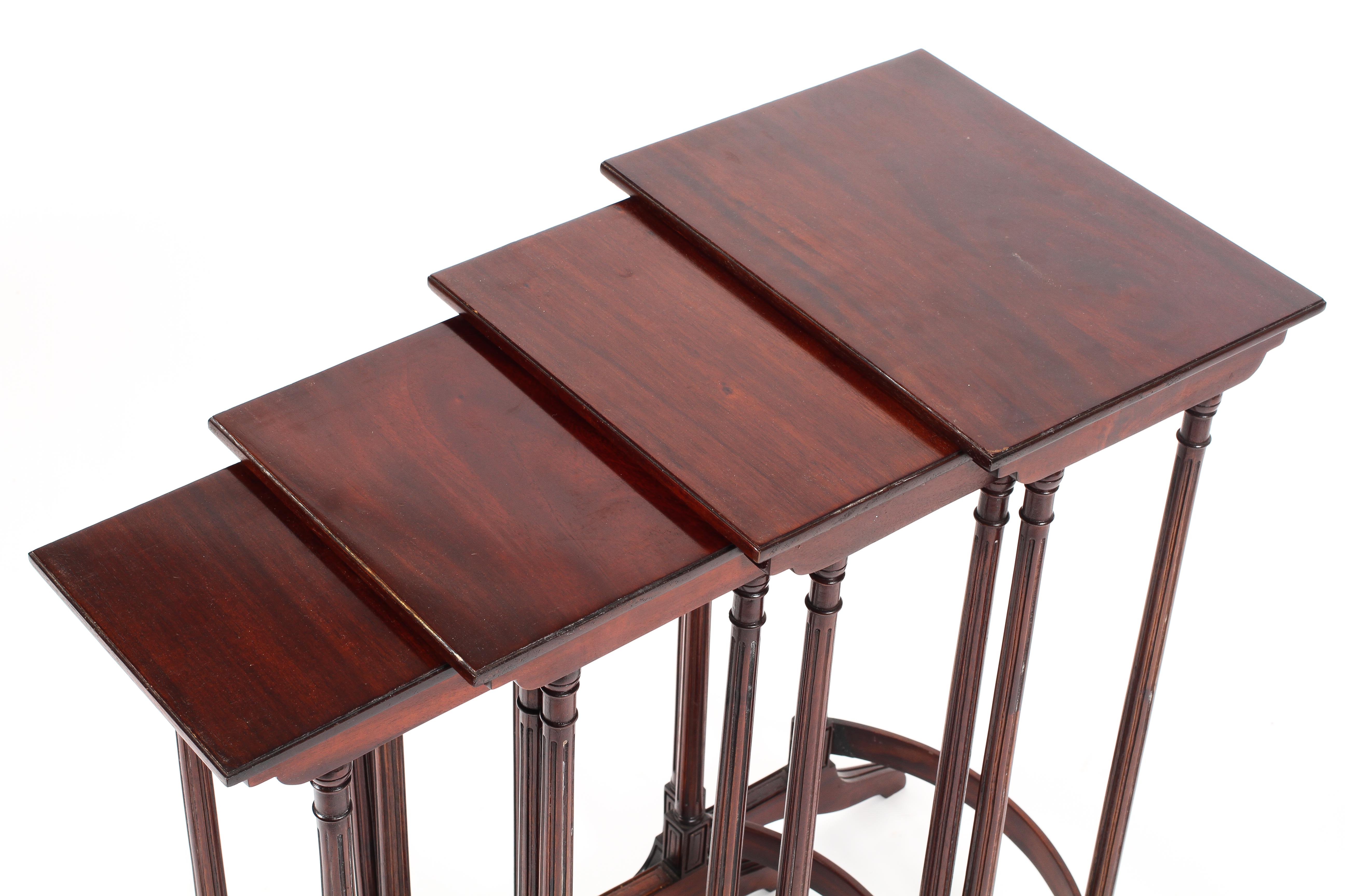 A quartetto nest of mahogany tables on reeded legs and saber supports Condition Report: - Image 3 of 3