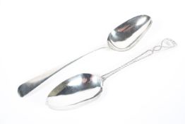 Two George III silver table spoons, one being hallmarked London 1780 by John Lambe,