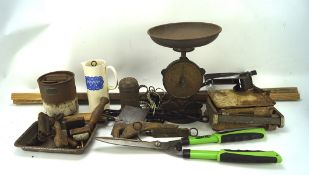 A box of assorted kitchenalia, including a mixer, pocket scales,