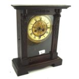 A 20th century mantle clock, the embossed floral dial with Roman numerals,