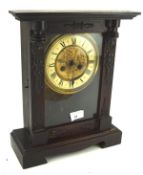 A 20th century mantle clock, the embossed floral dial with Roman numerals,