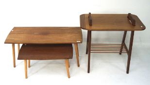 A group of three retro tables, two being matching, nest form, on graduating supports,